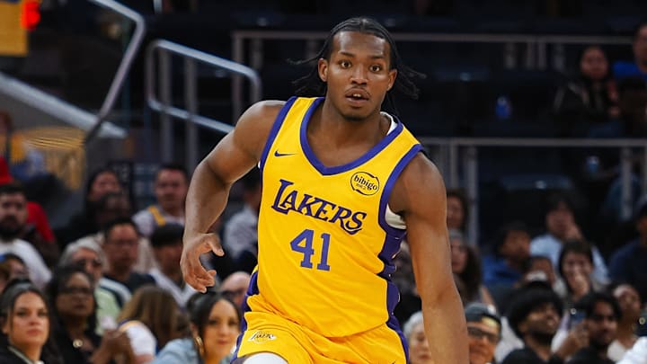 Jul 7, 2024; San Francisco, CA, USA; Los Angeles Lakers guard Quincy Olivari (41) controls the ball against the Golden State Warriors during the first quarter at Chase Center. Mandatory Credit: Kelley L Cox-Imagn Images