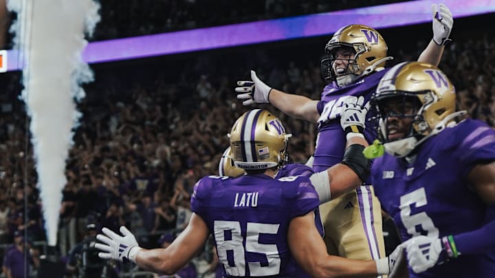 Decker DeGraaf celebrates his 33-yard touchdown catch on his first UW play.
