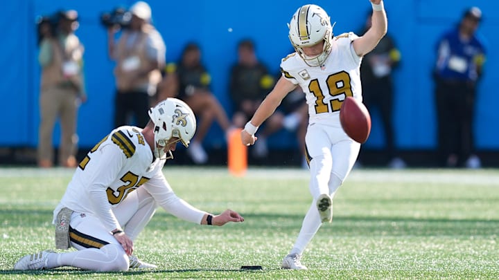 Nov 9, 2025; Charlotte, North Carolina, USA; New Orleans Saints place kicker Blake Grupe (19) kicks a field goal during the second quarter against the Carolina Panthers at Bank of America Stadium. Mandatory Credit: Jim Dedmon-Imagn Images