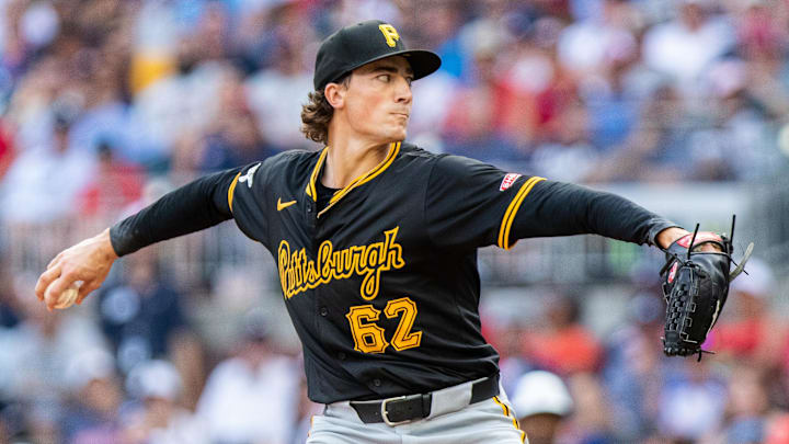 Jun 29, 2024; Cumberland, Georgia, USA; Pittsburgh Pirates pitcher Kyle Nicolas (62) pitches the ball against Atlanta Braves during the tenth inning at Truist Park. Mandatory Credit: Jordan Godfree-Imagn Images