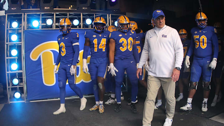 Nov 16, 2024; Pittsburgh, Pennsylvania, USA; Pittsburgh Panthers head coach Pat Narduzzi leads the Panthers out of the tunnel to play the Clemson Tigers at Acrisure Stadium. Mandatory Credit: Charles LeClaire-Imagn Images