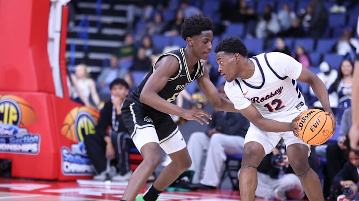 Roosevelt's Issac Williamson (with the ball) sizes up a Notre Dame defender in the CIF Southern Section Open Division final.
