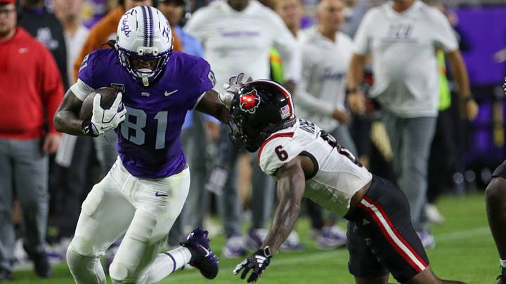 TCU tight end Kari Ashley (81) carries the ball against Arkansas State at Amon G. Carter Stadium. TCU tight end Kari Ashley (81) carries the ball against Arkansas State at Amon G. Carter Stadium.
