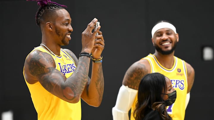 Sep 28, 2021; Los Angeles, CA, USA; Los Angeles Lakers center Dwight Howard (39) and forward Carmelo Anthony (7) laugh during media day at the UCLA Health and Training Center in El Segundo, Calif.  Mandatory Credit: Jayne Kamin-Oncea-Imagn Images