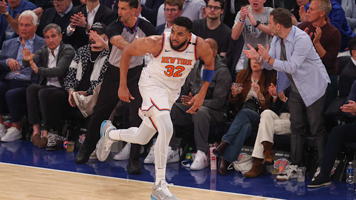 May 29, 2025; New York, New York, USA; New York Knicks center Karl-Anthony Towns (32) runs up court after a basket in game five of the eastern conference finals of the 2025 NBA Playoffs against the Indiana Pacers at Madison Square Garden. Mandatory Credit: Vincent Carchietta-Imagn Images