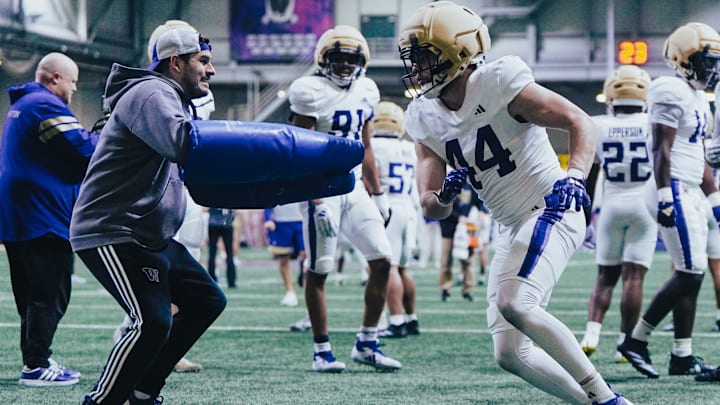 Hayden Moore deals with dummy-holding edge coach Aaron Van Horn.