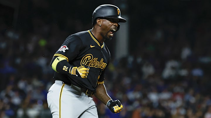 Pittsburgh Pirates outfielder Andrew McCutchen (22) celebrates as he rounds the bases after hitting a solo home run against the Chicago Cubs during the eighth inning at Wrigley Field.