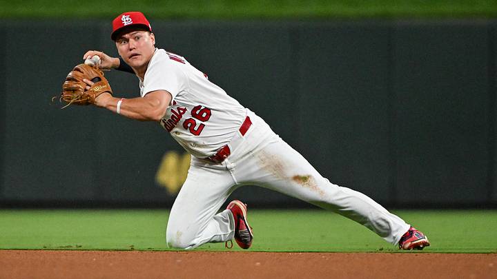 Jun 24, 2026; St. Louis, Missouri, USA; St. Louis Cardinals second baseman JJ Wetherholt (26) throws from his knees against the Arizona Diamondbacks during the seventh inning at Busch Stadium. Mandatory Credit: Jeff Curry-Imagn Images