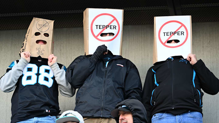Carolina Panthers fans Alex Alday, John Alday, and Jon Yonke