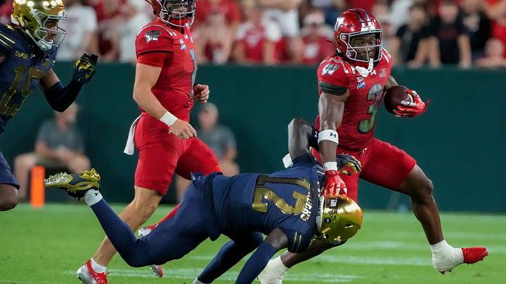 Wisconsin running back Abu Sama III (3) stiff-arms Notre Dame cornerback Jayden Sanders (12) on Sunday, Sept. 6, 2026, at Lambeau Field in Green Bay, Wisconsin. Notre Dame won the game, 41-13.
Tork Mason/Green Bay Press-Gazette