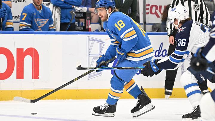 Oct 20, 2026; St. Louis, Missouri, USA;  St. Louis Blues center Robert Thomas (18) skates against Winnipeg Jets center Morgan Barron (36) during the second period at Enterprise Center.  Mandatory Credit: Jeff Le-Imagn Images