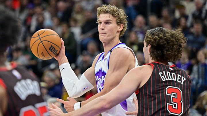 Nov 16, 2025; Salt Lake City, Utah, USA; Utah Jazz forward/center Lauri Markkanen (23) makes a pass around Chicago Bulls guard Josh Giddey (3) during the first half at Delta Center. Mandatory Credit: Peter Creveling-Imagn Images Nov 16, 2025; Salt Lake City, Utah, USA; Utah Jazz forward/center Lauri Markkanen (23) makes a pass around Chicago Bulls guard Josh Giddey (3) during the first half at Delta Center. Mandatory Credit: Peter Creveling-Imagn Images