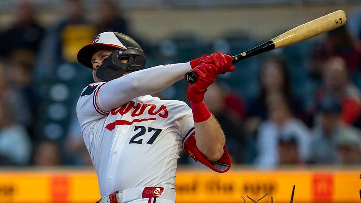 May 12, 2026; Minneapolis, Minnesota, USA; Minnesota Twins catcher Ryan Jeffers (27) hits a two run home run against the Miami Marlins in the fifth inning at Target Field. Mandatory Credit: Jesse Johnson-Imagn Images