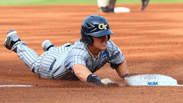 May 31, 2025; Oxford, MS, USA; Georgia Tech Yellowjackets outfielder Drew Burress (8) slides into third base during the first inning against the Murray State Racers. Mandatory Credit: Petre Thomas-Imagn Images