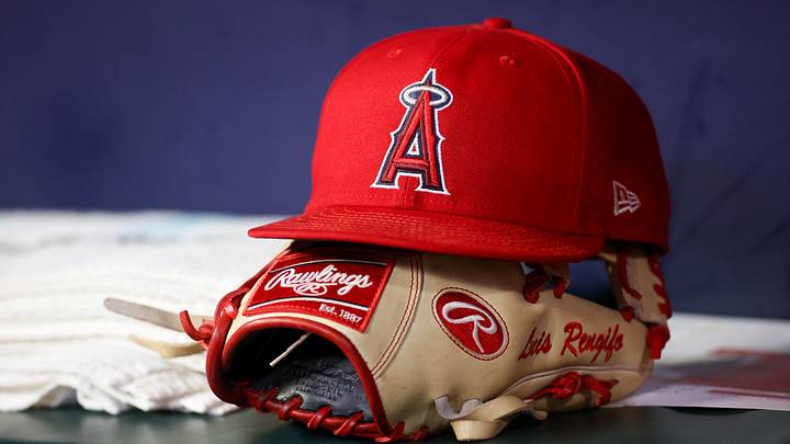 Aug 1, 2023; Atlanta, Georgia, USA; A detailed view of a Los Angeles Angels hat and glove on the bench against the Atlanta Braves in the eighth inning at Truist Park. Mandatory Credit: Brett Davis-Imagn Images Aug 1, 2023; Atlanta, Georgia, USA; A detailed view of a Los Angeles Angels hat and glove on the bench against the Atlanta Braves in the eighth inning at Truist Park. Mandatory Credit: Brett Davis-Imagn Images