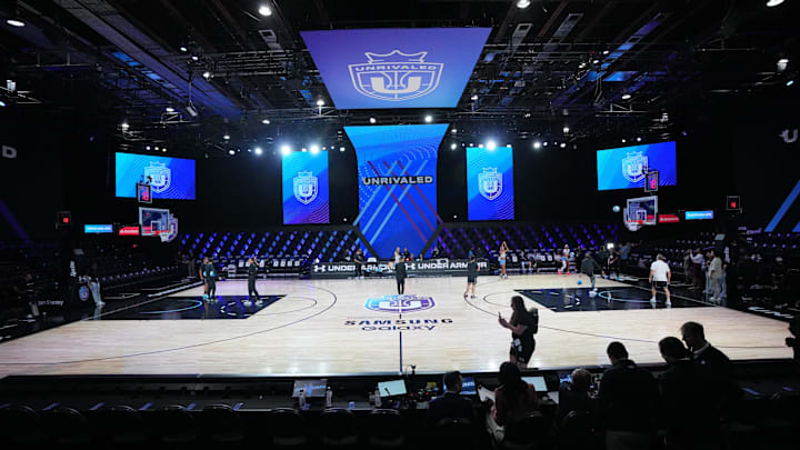 Players warm-up before the game between the Mist and the Lunar Owls of the Unrivaled women’s professional 3v3 basketball league at Wayfair Arena. 