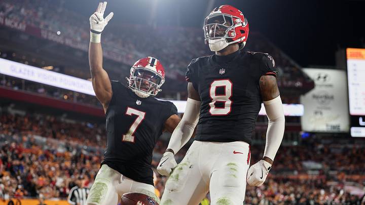 Dec 11, 2025; Tampa, Florida, USA; Atlanta Falcons tight end Kyle Pitts Sr. (8) celebrates with running back Bijan Robinson (7) after scoring a touchdown against the Tampa Bay Buccaneers during the second quarter at Raymond James Stadium. Mandatory Credit: Nathan Ray Seebeck-Imagn Images