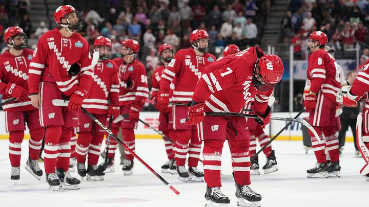 Apr 11, 2026; Las Vegas, Nevada, United States; Wisconsin Badgers forward Gavin Morrissey (7) reacts after losing to the Denver Pioneers in the championship game of the NCAA men's ice hockey Frozen Four at T-Mobile Arena.