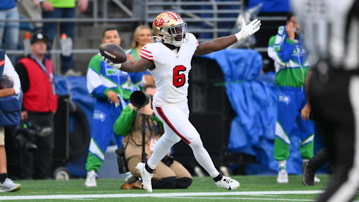 Oct 10, 2024; Seattle, Washington, USA; San Francisco 49ers safety Malik Mustapha (6) celebrates after intercepting the ball against the Seattle Seahawks during the first half at Lumen Field. Mandatory Credit: Steven Bisig-Imagn Images