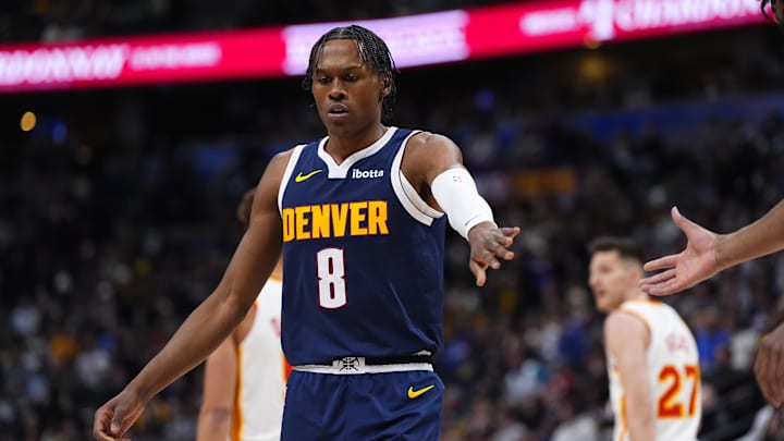 Jan 9, 2026; Denver, Colorado, USA; Denver Nuggets guard Peyton Watson (8) reacts during a timeout in the first quarter against the Atlanta Hawks at Ball Arena. 