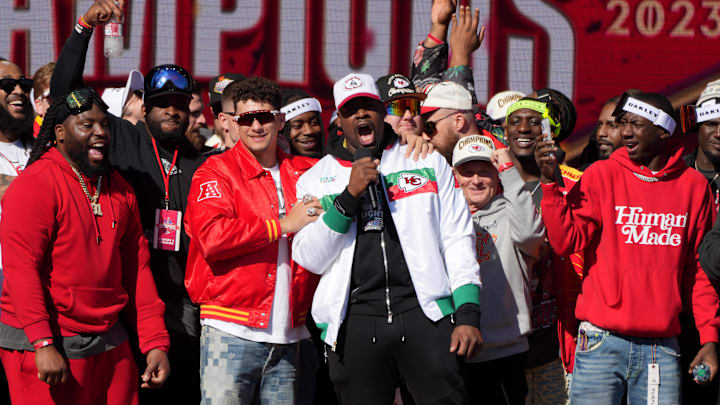 Feb 14, 2024; Kansas City, MO, USA;   Kansas City Chiefs defensive tackle Chris Jones (95) addresses the crowd on stage with quarterback Patrick Mahomes (15) during the celebration of the Kansas City Chiefs winning Super Bowl LVIII.  Mandatory Credit: Kirby Lee-USA TODAY Sports