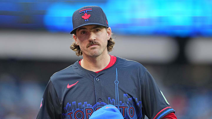 Jun 3, 2024; Toronto, Ontario, CAN; Toronto Blue Jays starting pitcher Kevin Gausman (34) walks towards the dugout prior to the start of a game against the Baltimore Orioles at Rogers Centre. Mandatory Credit: Nick Turchiaro-USA TODAY Sports
