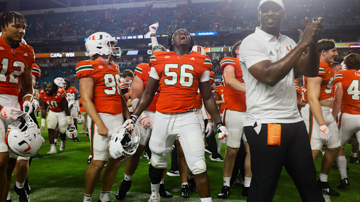 Sep 27, 2024; Miami Gardens, Florida, USA; Miami Hurricanes defensive lineman Iheukwumere Marcus (56) celebrates after the game against the Virginia Tech Hokies at Hard Rock Stadium. Mandatory Credit: Sam Navarro-Imagn Images