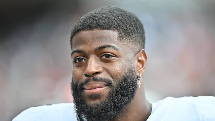 Cleveland Browns defensive end Jared Verse (8) looks on
