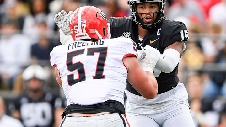 Oct 14, 2023; Nashville, Tennessee, USA;  Vanderbilt Commodores wide receiver Richie Hoskins (15) rushes the passer as Georgia Bulldogs offensive lineman Monroe Freeling (57) blocks during the second half at FirstBank Stadium. Mandatory Credit: Steve Roberts-Imagn Images
