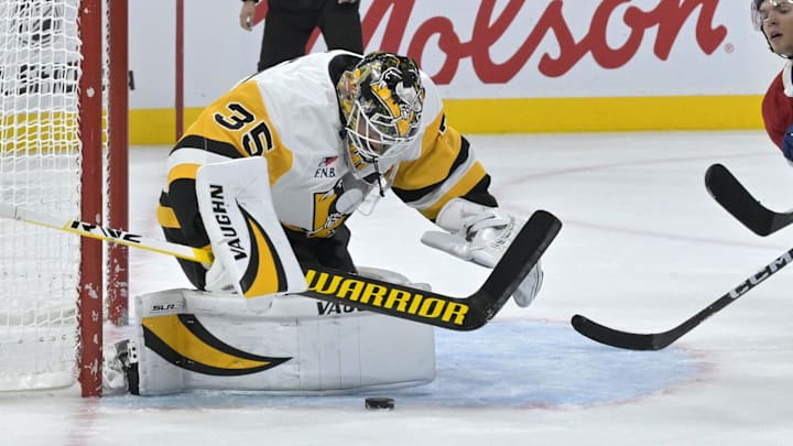 Oct 14, 2024; Montreal, Quebec, CAN; Pittsburgh Penguins goalie Tristan Jarry (35) makes a save against the Montreal Canadiens during the second period at the Bell Centre. Mandatory Credit: Eric Bolte-Imagn Images