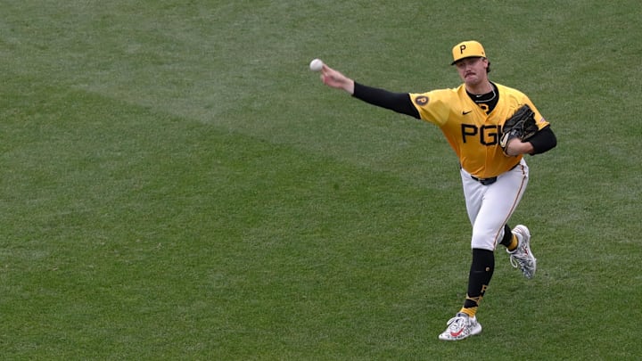 Pittsburgh Pirates starting pitcher Paul Skenes (30) warms up in the outfield before the game against the Seattle Mariners at PNC Park. 