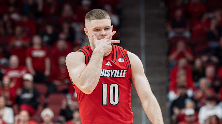 Louisville Cardinals guard Isaac McKneely (10) celebrates after scoring a three point basket as the Louisville Cardinals host the Georgia Tech Yellow Jackets in an NCAA basketball game at the KFC Yum! Center, Saturday, Feb. 21, 2026, in Louisville. Louisville Cardinals guard Isaac McKneely (10) celebrates after scoring a three point basket as the Louisville Cardinals host the Georgia Tech Yellow Jackets in an NCAA basketball game at the KFC Yum! Center, Saturday, Feb. 21, 2026, in Louisville.