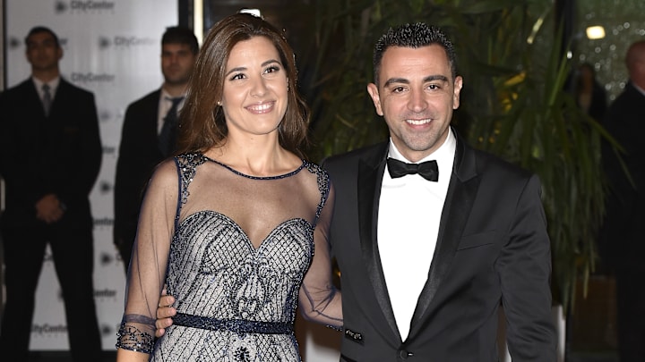 Xavi Hernández y su esposa Nuria Cunillera en la boda de Lionel Messi, celebrada en Argentina