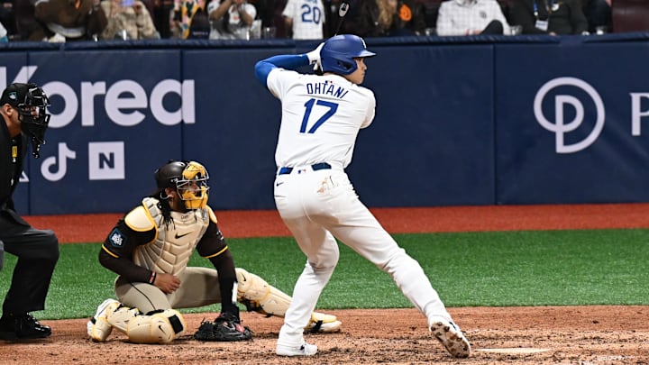 Shohei Ohtani at bat versus the San Diego Padres in the 2024 Seoul Series. Ohtani's former interpreter is involved in an investigation by MLB as part of a greater probe.