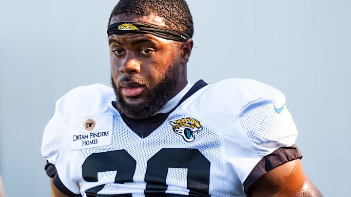 Jacksonville Jaguars safety Daniel Thomas (20) takes his helmet off after warmups during an NFL training camp fifth session at the Miller Electric Center, Monday, July 28, 2025, in Jacksonville, Fla. 