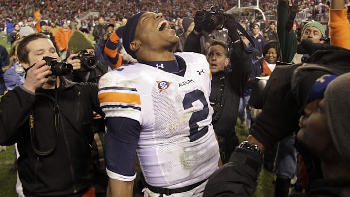 Nov 26, 2010; Tuscaloosa, AL, USA; Auburn Tigers quarterback Cam Newton (2) celebrates after the Tigers beat the Alabama Crimson Tide 28-27 at Bryant-Denny Stadium. Mandatory Credit: John Reed-Imagn Images