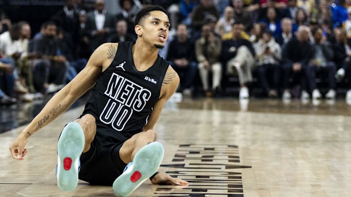 Mar 25, 2026; San Francisco, California, USA; Brooklyn Nets forward Josh Minott (00) stumbles during the first quarter against the Golden State Warriors at Chase Center. Mandatory Credit: John Hefti-Imagn Images Mar 25, 2026; San Francisco, California, USA; Brooklyn Nets forward Josh Minott (00) stumbles during the first quarter against the Golden State Warriors at Chase Center. Mandatory Credit: John Hefti-Imagn Images