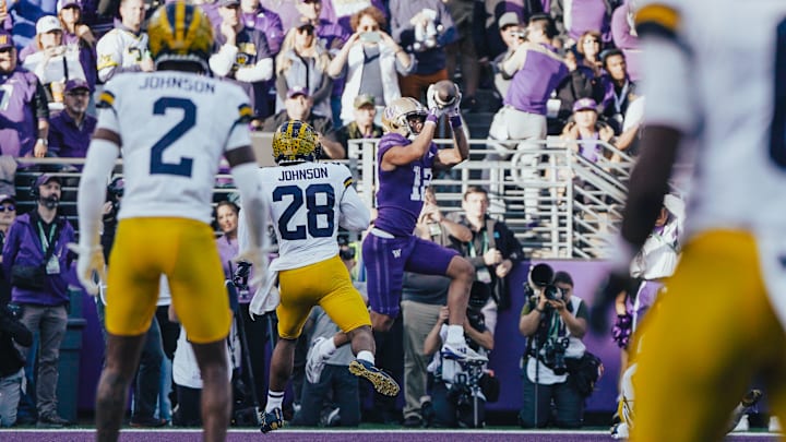 Denzel Boston makes a touchdown catch against Michigan. Denzel Boston makes a touchdown catch against Michigan.