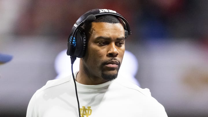 Jan 20, 2025; Atlanta, GA, USA; Notre Dame Fighting Irish defensive backs coach Mike Mickens against the Ohio State Buckeyes during the CFP National Championship college football game at Mercedes-Benz Stadium. Mandatory Credit: Mark J. Rebilas-Imagn Images Jan 20, 2025; Atlanta, GA, USA; Notre Dame Fighting Irish defensive backs coach Mike Mickens against the Ohio State Buckeyes during the CFP National Championship college football game at Mercedes-Benz Stadium. Mandatory Credit: Mark J. Rebilas-Imagn Images