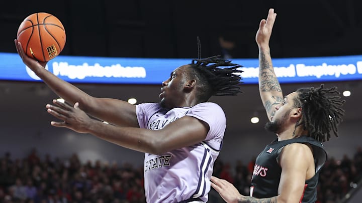 Jan 27, 2024; Houston, Texas, USA; Kansas State Wildcats forward Arthur Kaluma (24) shoots the ball against Houston.