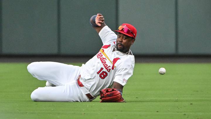 Jun 24, 2026; St. Louis, Missouri, USA; St. Louis Cardinals right fielder Jordan Walker (18) dives but is unable to catch a one run single hit by Arizona Diamondbacks center fielder Tommy Troy (not pictured) during the fourth inning at Busch Stadium. Mandatory Credit: Jeff Curry-Imagn Images