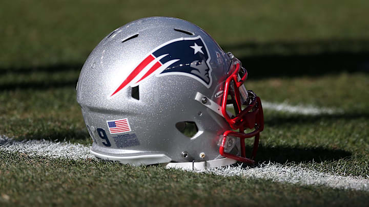 January 19, 2014; Denver, CO, USA; New England Patriots helmet on field before the 2013 AFC Championship football game  against the Denver Broncos at Sports Authority Field at Mile High. Mandatory Credit: Mark J. Rebilas-Imagn Images