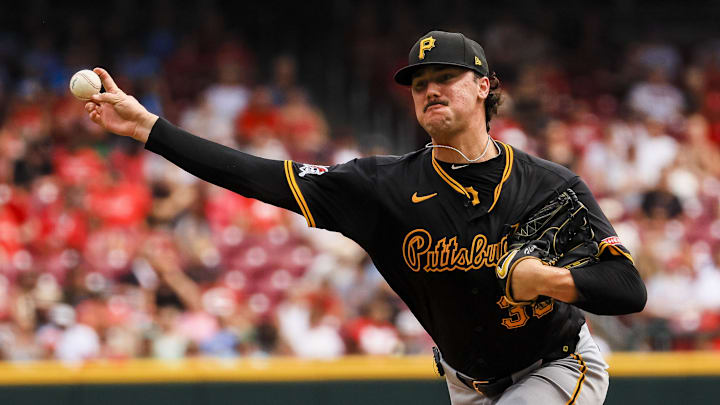 Pittsburgh Pirates starting pitcher Paul Skenes (30) pitches against the Cincinnati Reds in the third inning at Great American Ball Park. 