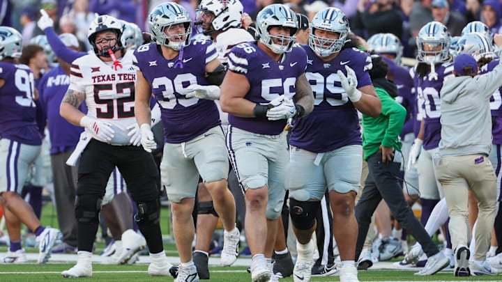 Kansas State Wildcats defensive tackle Damian Ilalio, defensive end Travis Bates