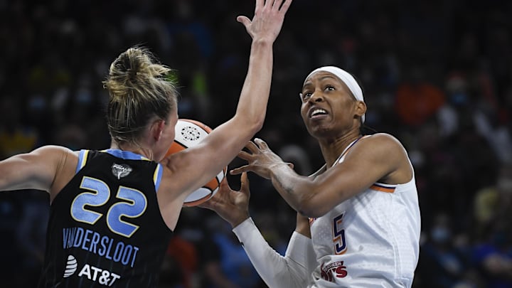 Oct 15, 2021; Chicago, Illinois, USA; Chicago Sky guard Courtney Vandersloot (22) blocks Phoenix Mercury guard Shey Peddy (5) during the first half of game three of the 2021 WNBA Finals at Wintrust Arena. Mandatory Credit: Matt Marton-Imagn Images