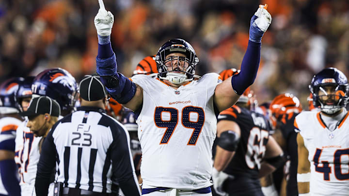 Dec 28, 2024; Cincinnati, Ohio, USA; Denver Broncos defensive end Zach Allen (99) reacts after a play against the Cincinnati Bengals in the second half at Paycor Stadium. Mandatory Credit: Katie Stratman-Imagn Images