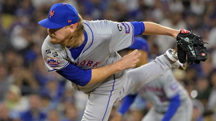 Oct 20, 2024; Los Angeles, California, USA; New York Mets pitcher Ryne Stanek (55) pitches in the sixth inning against the Los Angeles Dodgers during game six of the NLCS for the 2024 MLB playoffs at Dodger Stadium. Mandatory Credit: Jayne Kamin-Oncea-Imagn Images