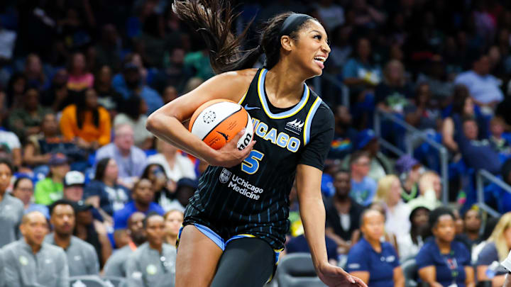 Chicago Sky forward Angel Reese (5) laughs during the second half against the Dallas Wings at College Park.