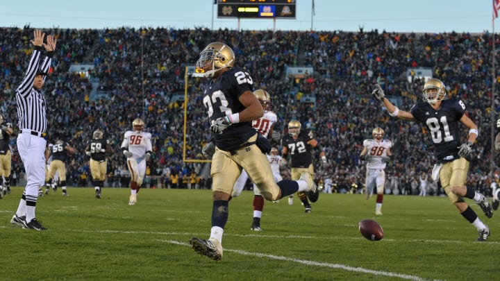 Oct. 24, 2009; South Bend, IN, USA; Notre Dame Fighting Irish wide receiver Golden Tate (23) scores a touchdown in the fourth quarter against the Boston College Eagles at Notre Dame Stadium. Notre Dame won 20-16. Mandatory Credit: Matt Cashore-USA TODAY Sports