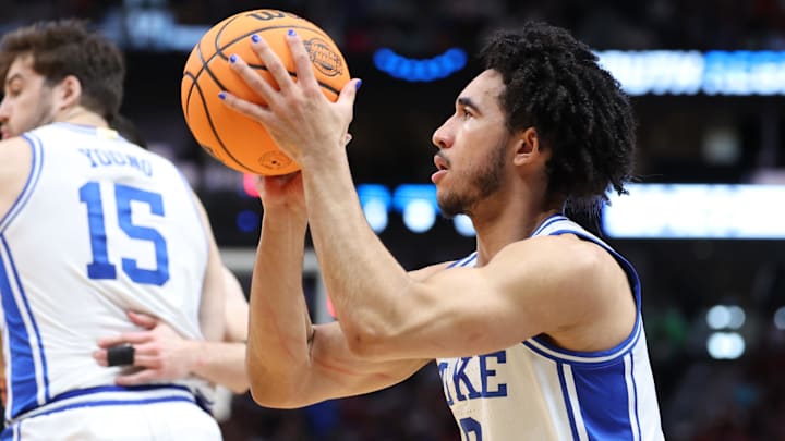 Mar 31, 2024; Dallas, TX, USA; Duke Blue Devils guard Jared McCain (0) shoots against the North Carolina State Wolfpack in the first half in the finals of the South Regional of the 2024 NCAA Tournament at American Airline Center. Mandatory Credit: Kevin Jairaj-Imagn Images
